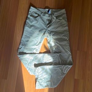 Divided mid-rise flair pants with funky swirl design size US 10